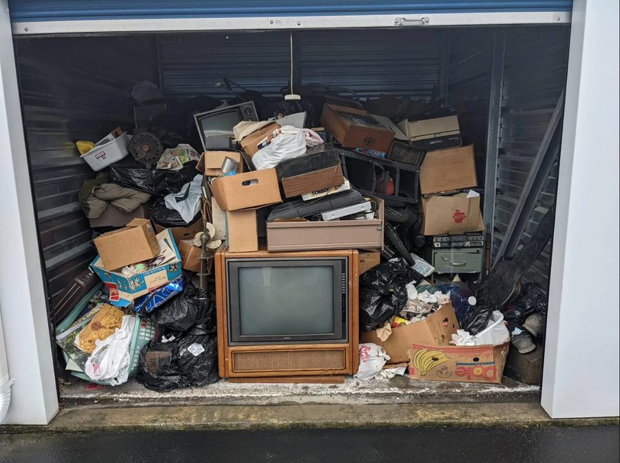Storage unit full of boxes before a cleanout