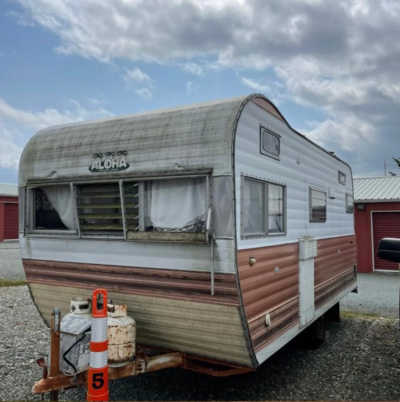 Old camper trailer ready for removal